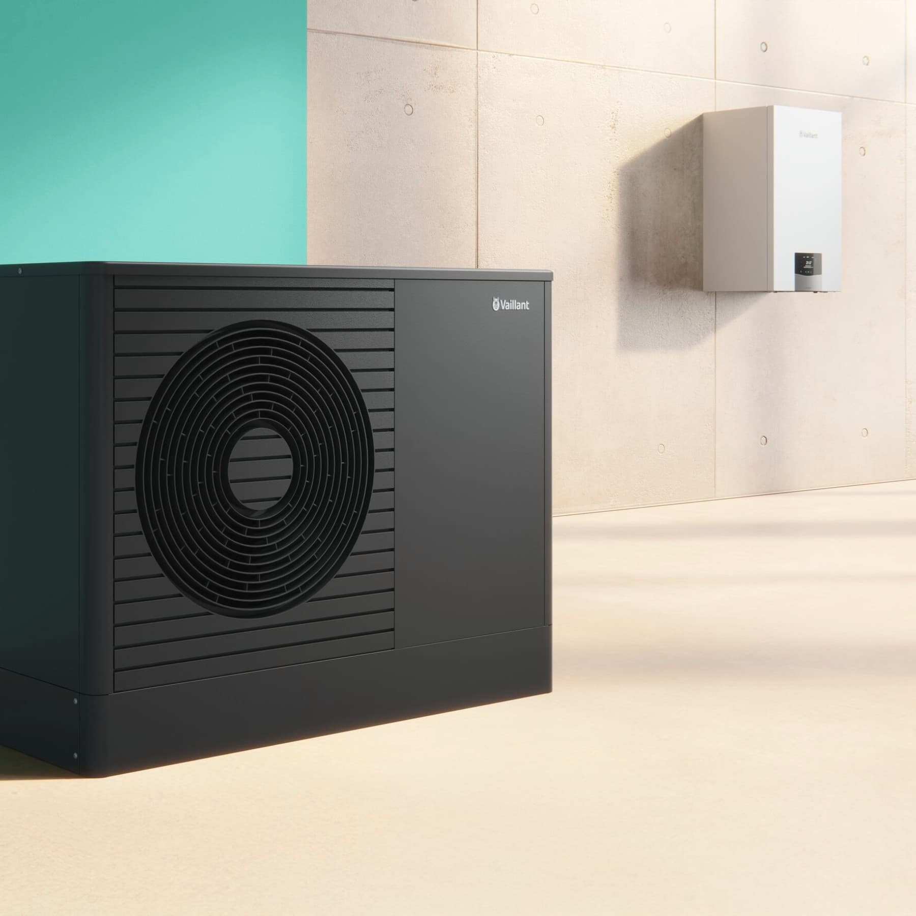 Une unité extérieure anthracite installée devant le mur de présentation | Vaillant