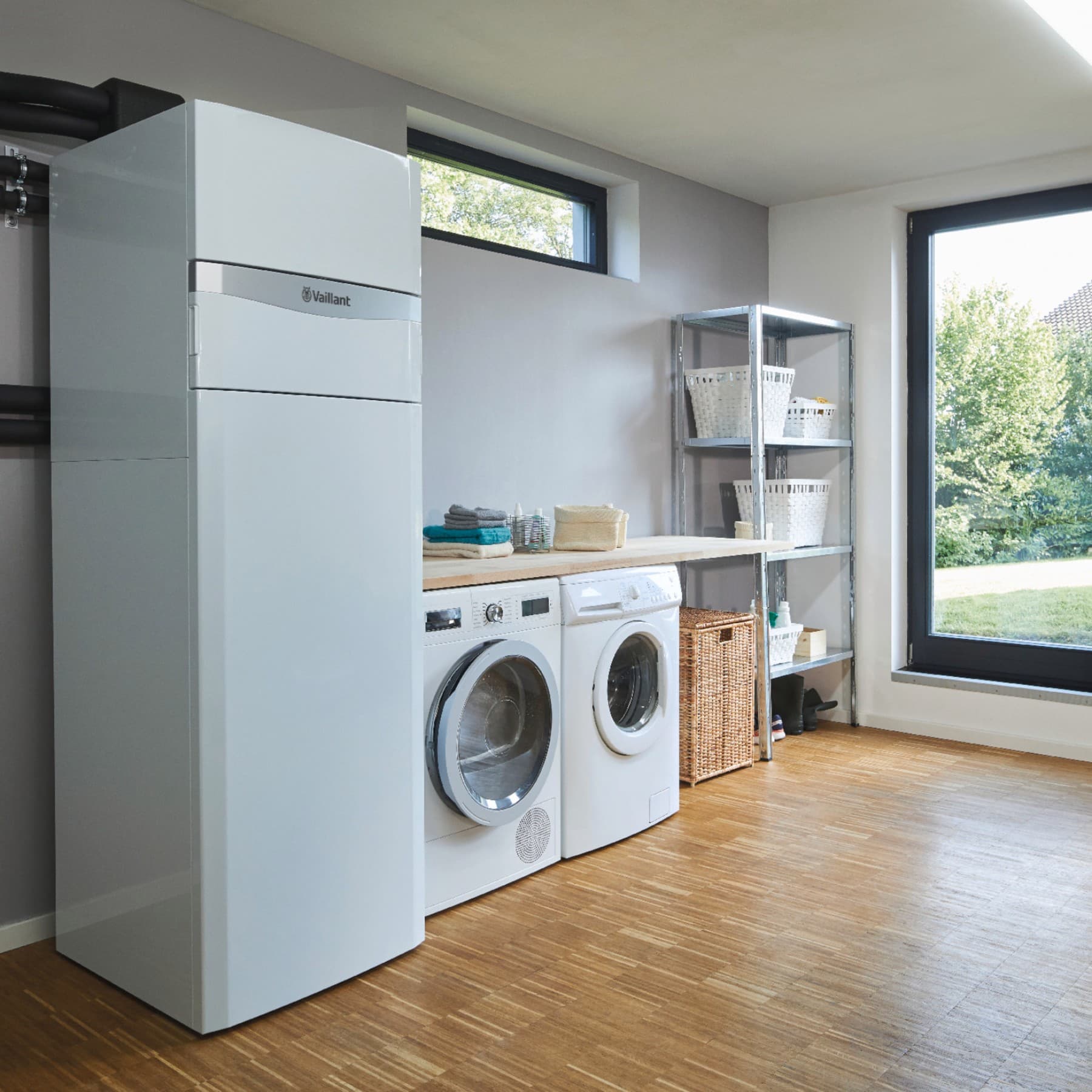 Une pompe à chaleur géothermique dans une buanderie | Vaillant