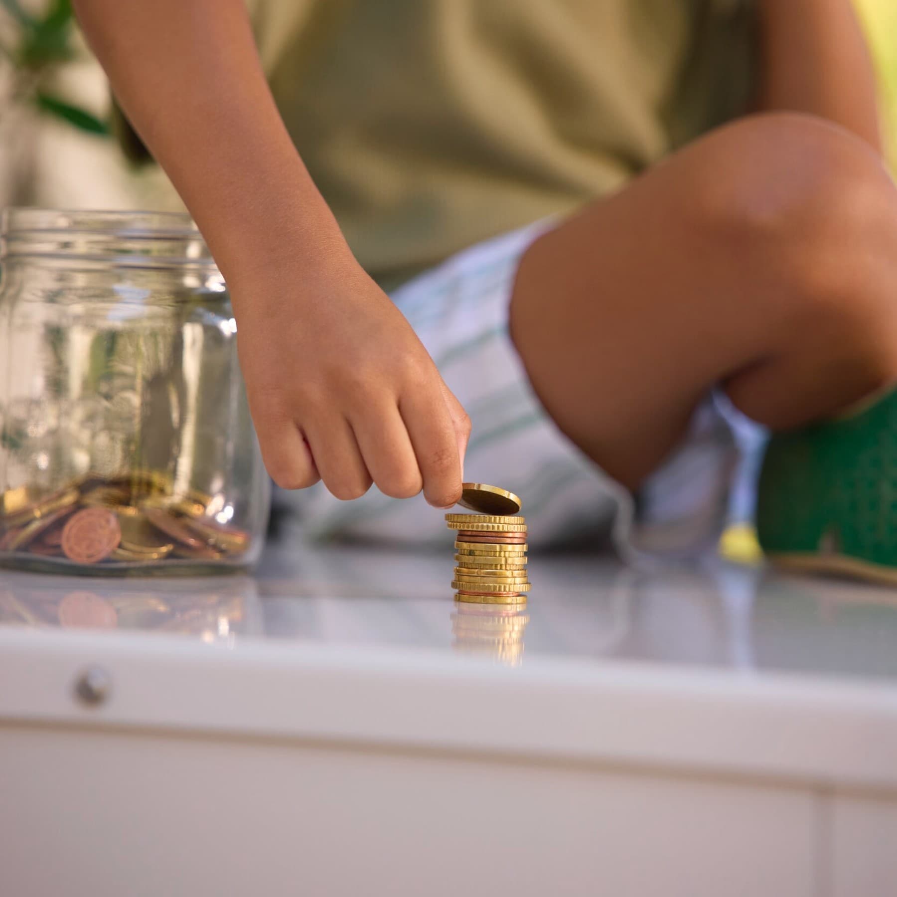 Enfant comptant son argent | Vaillant