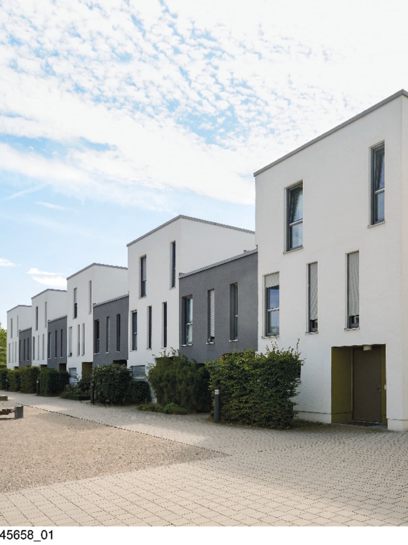 Un ensemble de logements avec une cour extérieure boisée | Vaillant