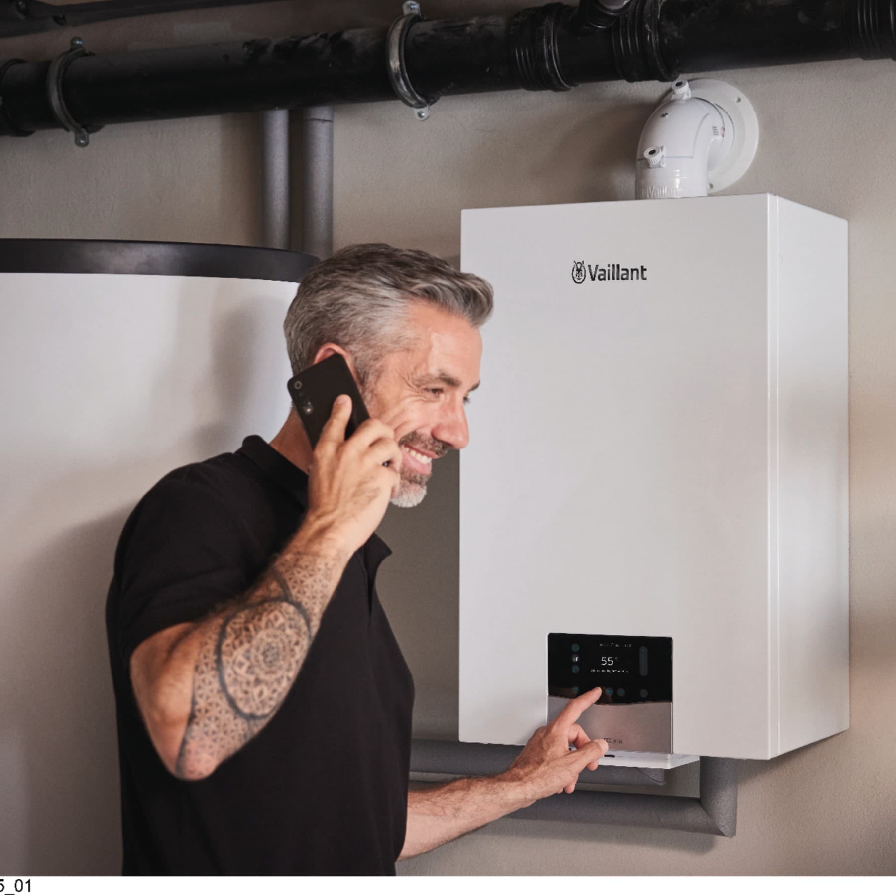 Installateur avec chaudière murale